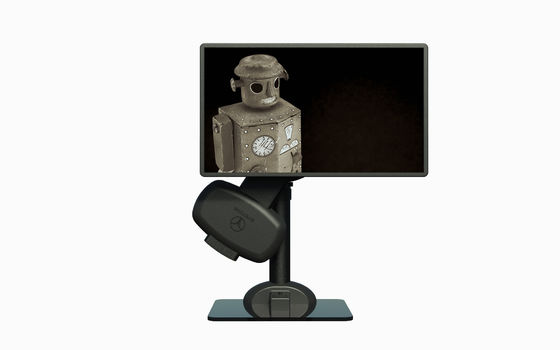 Sollevamento automatico e rotazione del monitor LCD del portatile per alleviare il dolore al collo